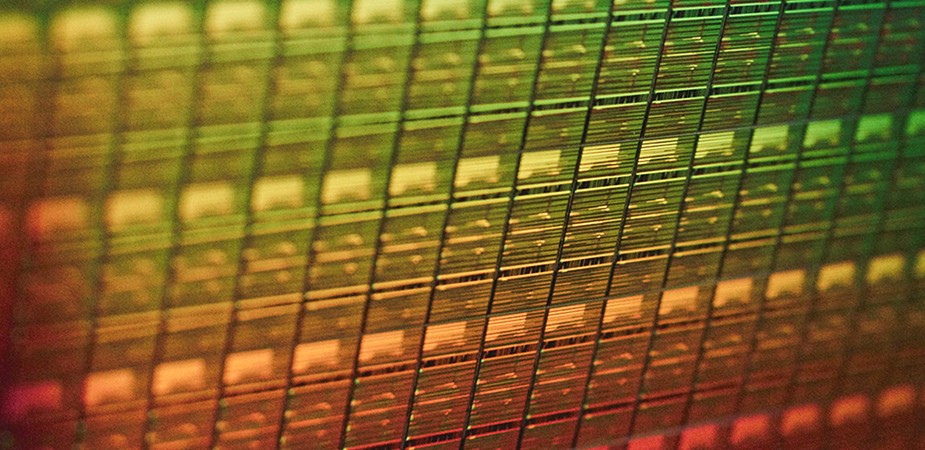 teal, blue, purple, red and green gradient light on fabric with micron DEI logo and International Women in Engineering Day text